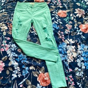 Cute mint colored distressed skinny jeans